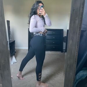 Alphalete leggings with crisscross opening at the bottom